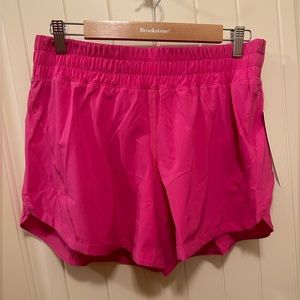 Lululemon Track that 5 inch shorts. Sonic pink. Size 12. NWT